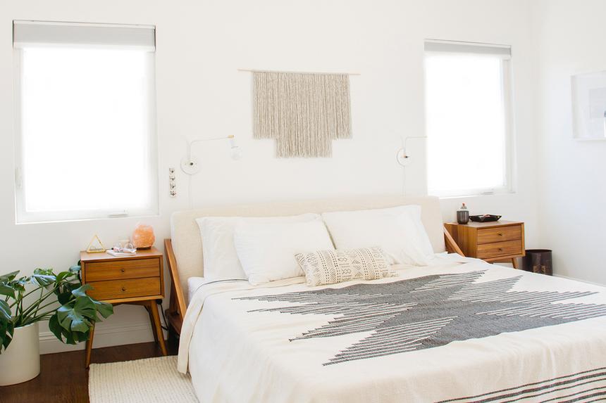 White bedroom with high ceilings