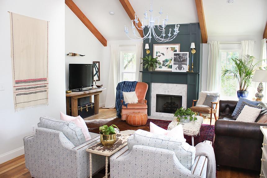 White painted living room with exposed wood beams