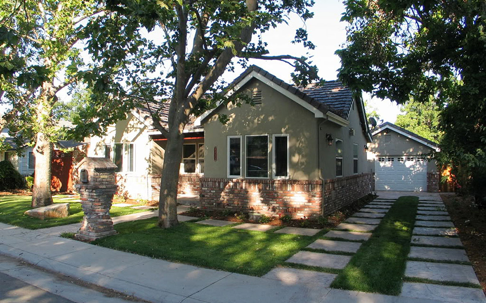 Redone front yard hardscape with paver driveway