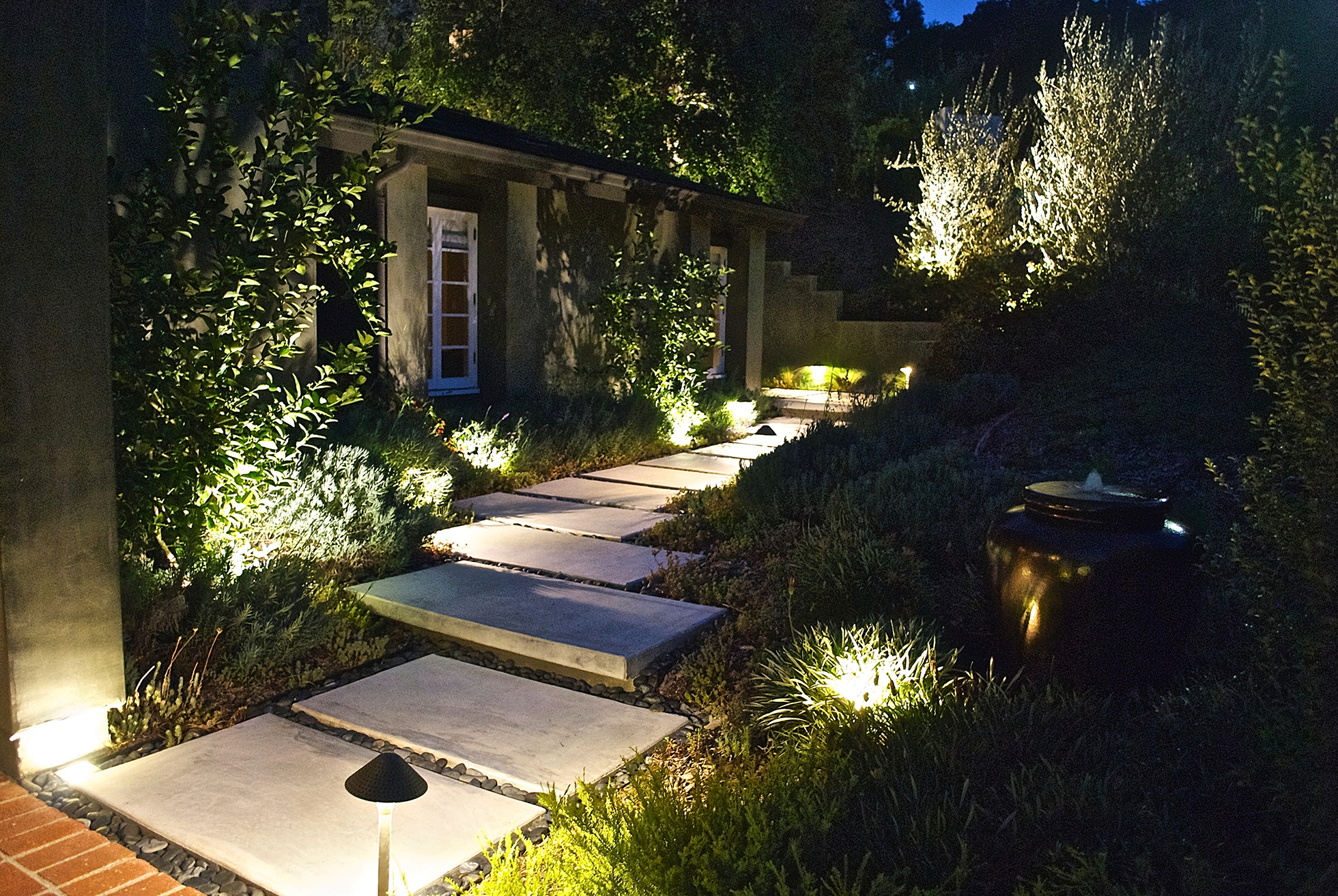 Front yard in Southern California illuminated at night